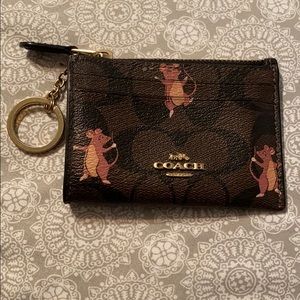 Authentic coach wristlet with small defect